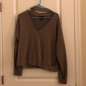 Sweater with v-shapes cutout